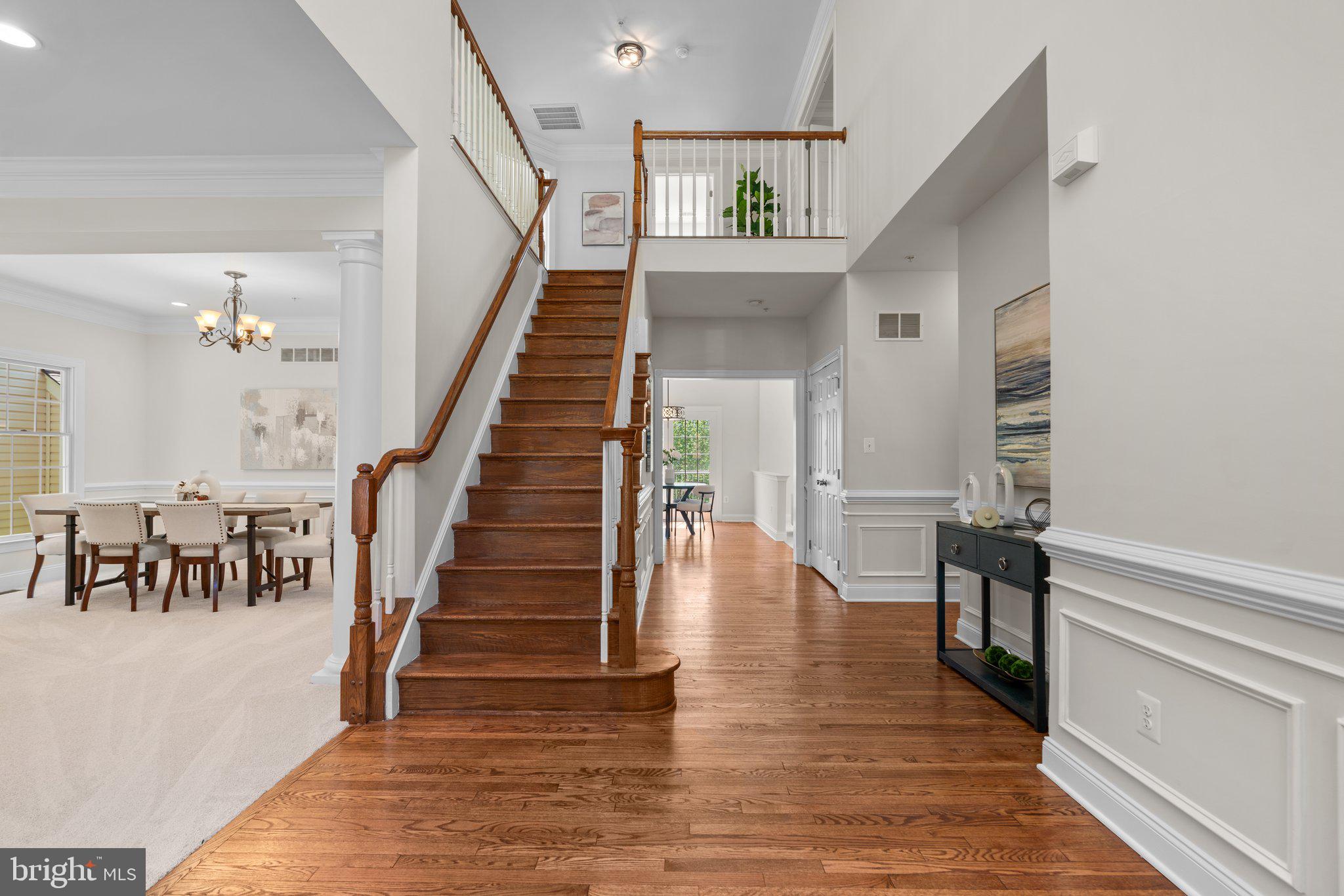 22104 Ginger Tree Way Clarksburg, MD 20871 - Photo 3 of 57 a view of entryway and hall with wooden floor