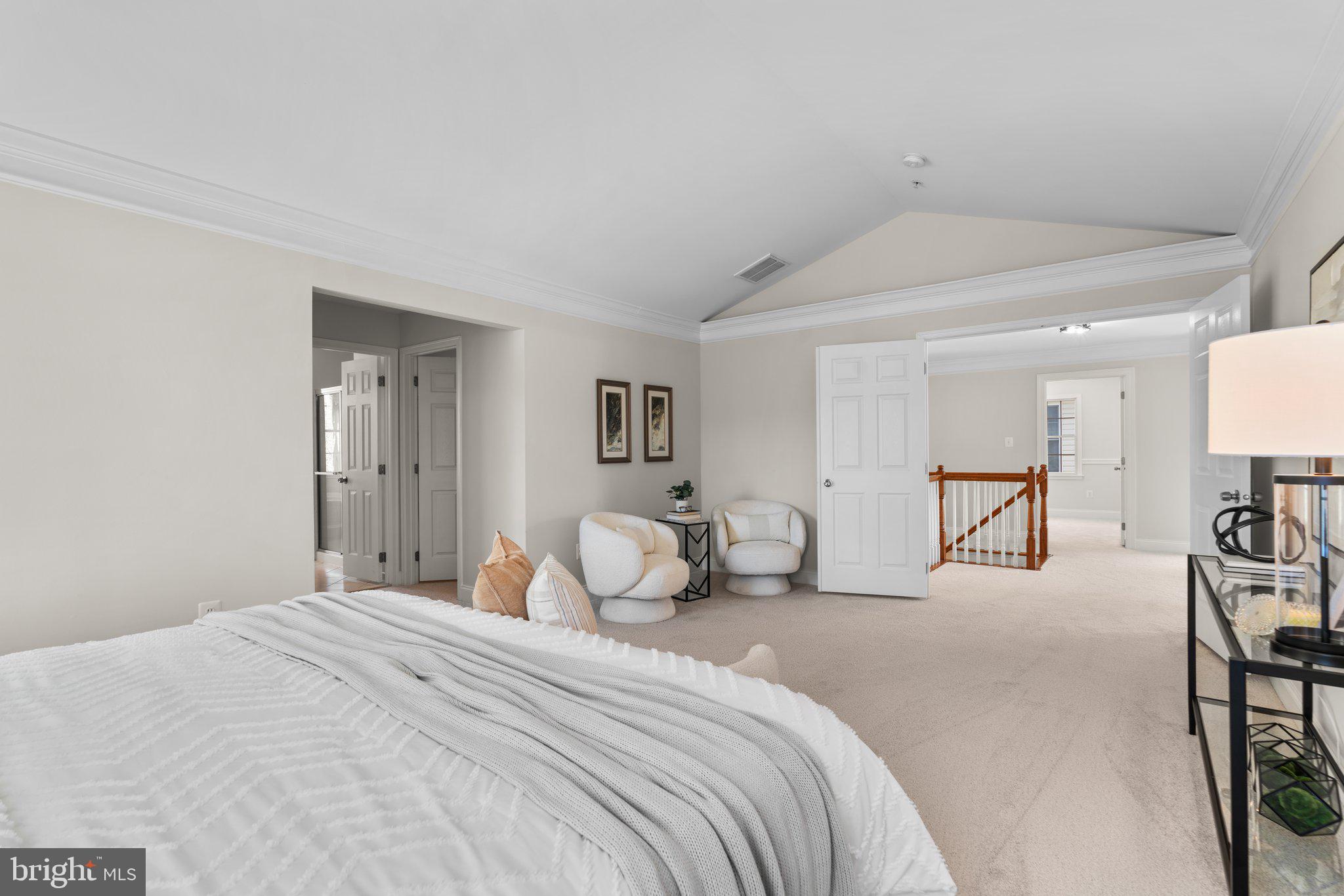 22104 Ginger Tree Way Clarksburg, MD 20871 - Photo 32 of 57 a bedroom with a bed and table chair