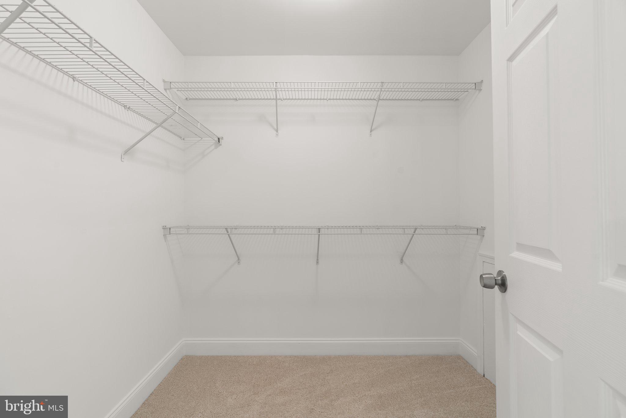 22104 Ginger Tree Way Clarksburg, MD 20871 - Photo 33 of 57 a view of a room with racks on the wall