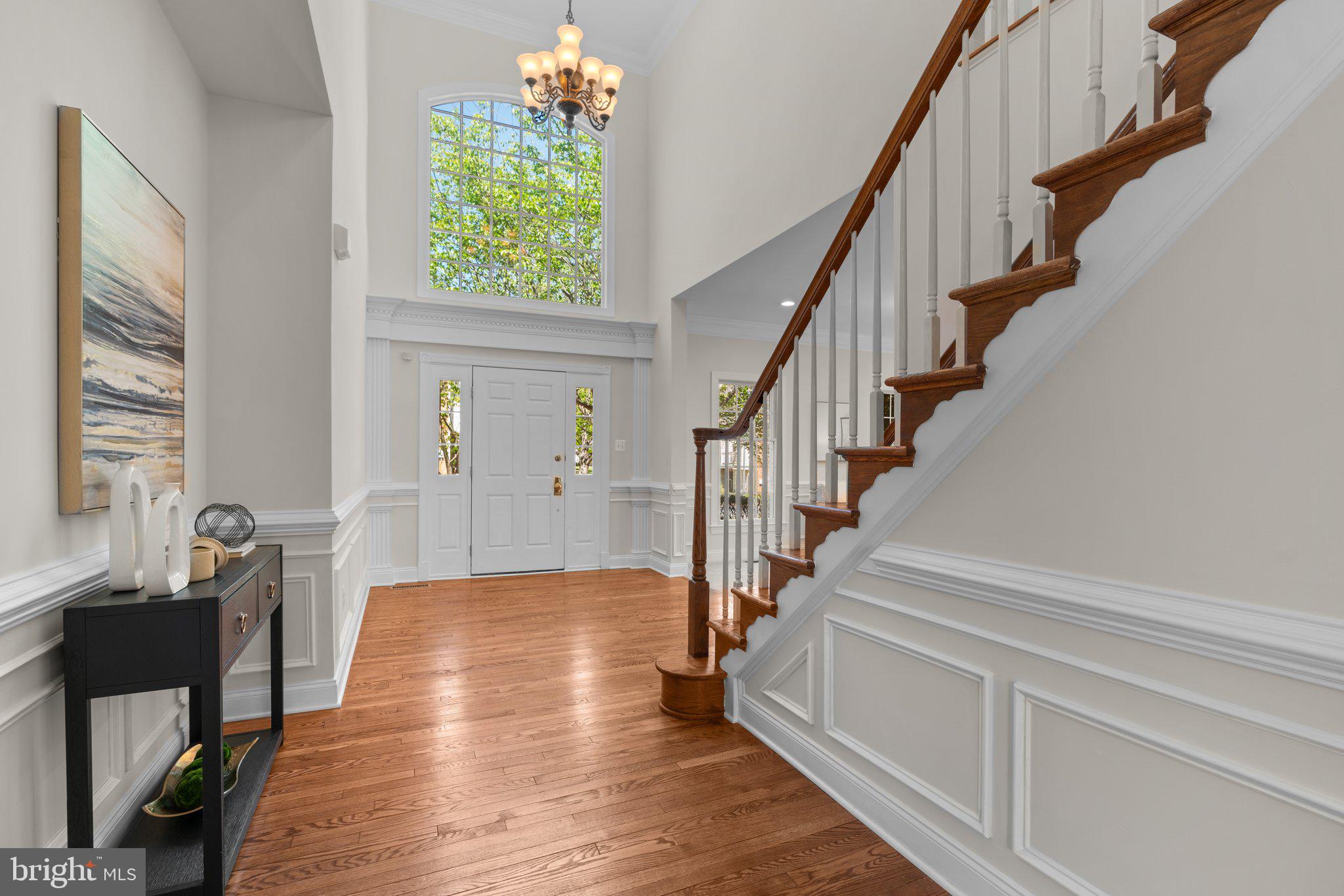 22104 Ginger Tree Way Clarksburg, MD 20871 - Photo 4 of 57 a view of entryway and hall with wooden floor