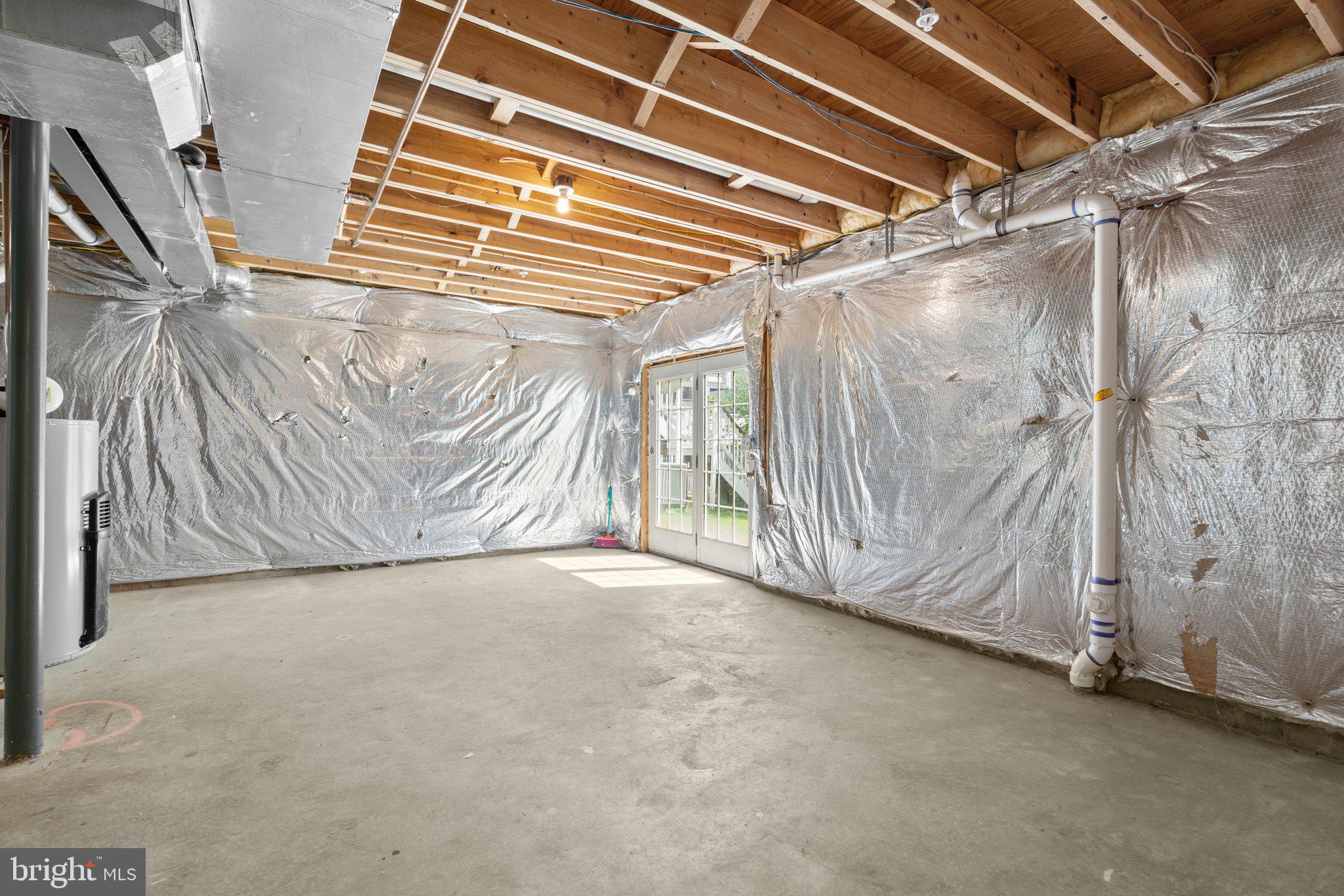 22104 Ginger Tree Way Clarksburg, MD 20871 - Photo 53 of 57 a view of an empty room with stairs