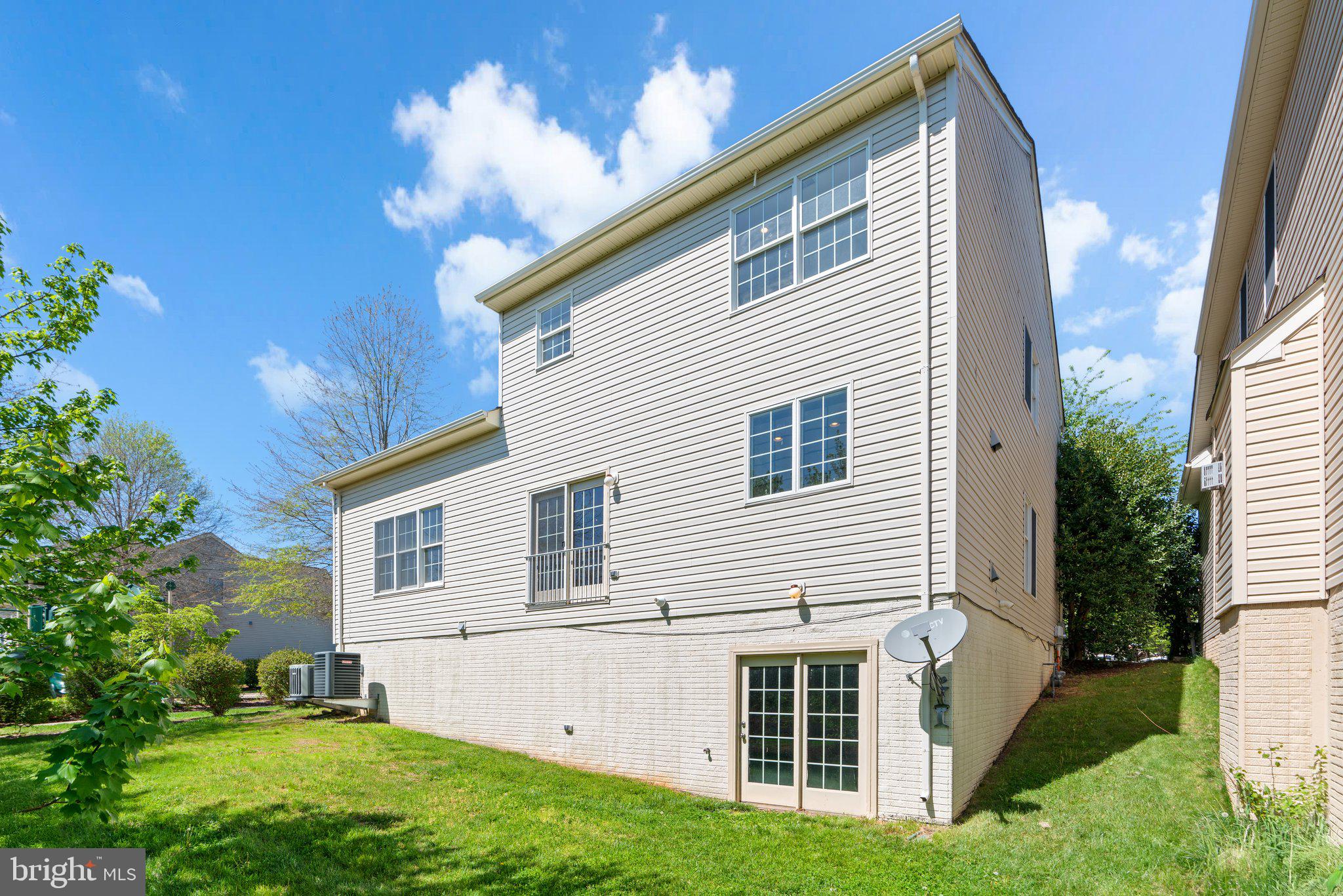 22104 Ginger Tree Way Clarksburg, MD 20871 - Photo 54 of 57 a view of a house with a yard