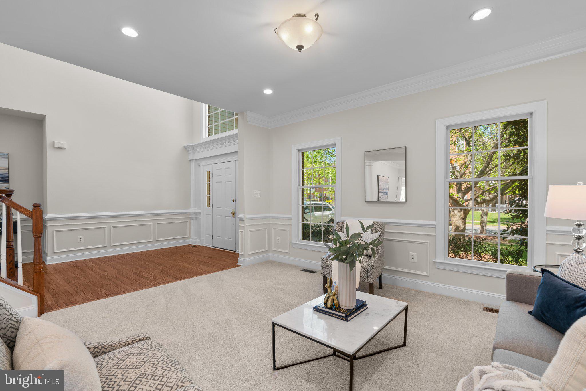 22104 Ginger Tree Way Clarksburg, MD 20871 - Photo 7 of 57 a living room with furniture and window