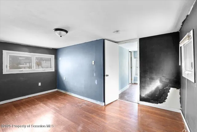 a view of livingroom with workspace