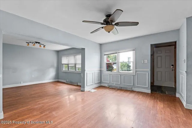 a view of livingroom with hardwood floor and window