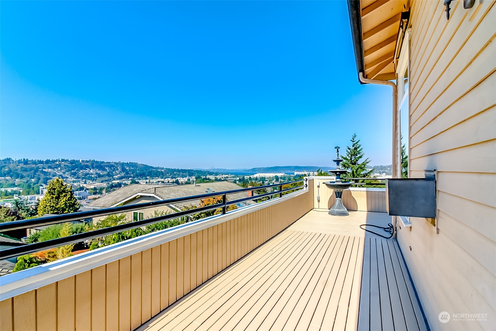 350 Renton Avenue South Renton, WA 98057 - Photo 7 of 40 a view of a balcony with wooden floor and fence