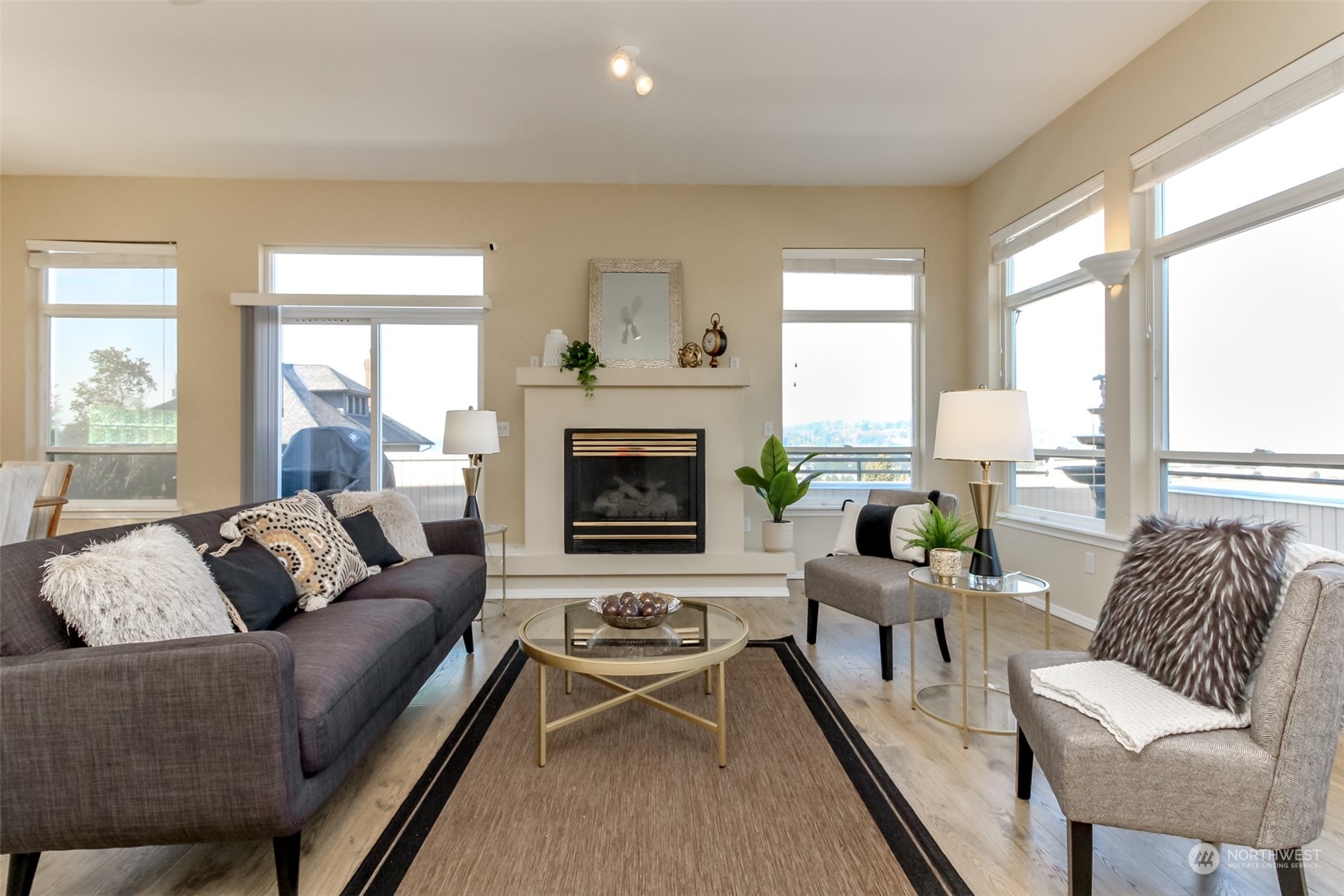 350 Renton Avenue South Renton, WA 98057 - Photo 10 of 40 a living room with furniture and a fireplace