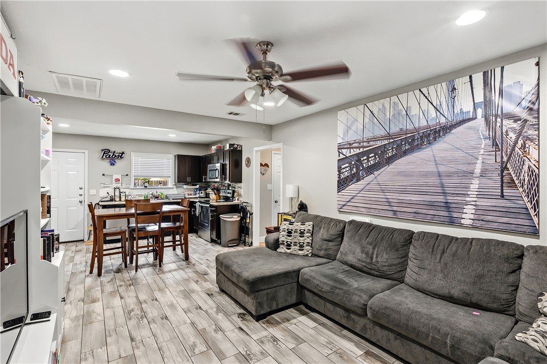 112 Ehlinger Drive Bryan, TX 77801 - Photo 3 of 18 a living room with furniture kitchen view and a large window