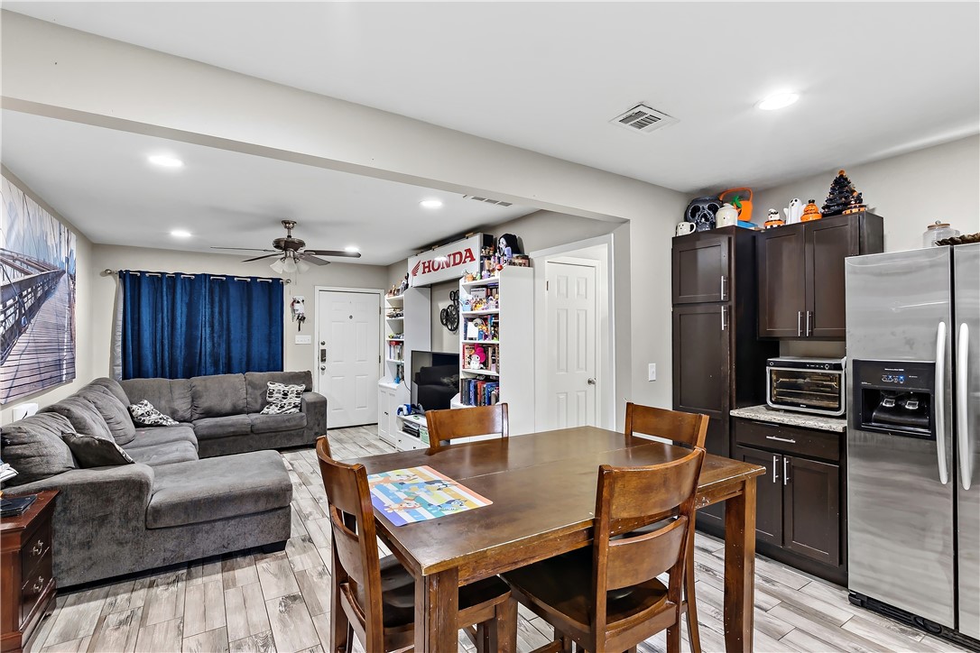 112 Ehlinger Drive Bryan, TX 77801 - Photo 9 of 18 a living room with furniture and kitchen view