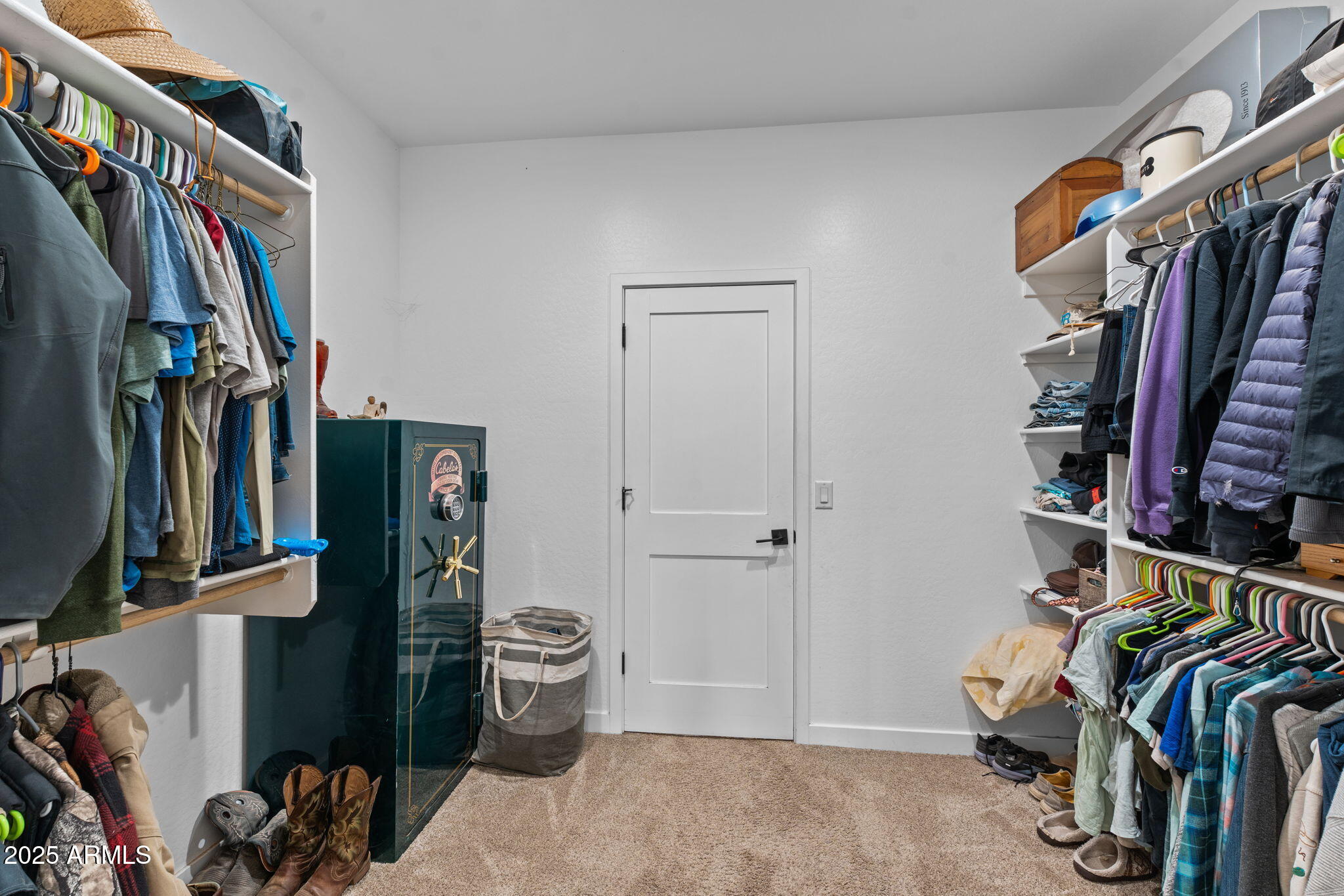 46130 West Trotter Road Wickenburg, AZ 85390 - Photo 24 of 55 a view of walk in closet with clothes