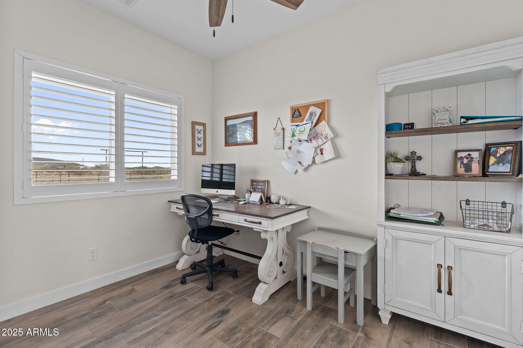 46130 West Trotter Road Wickenburg, AZ 85390 - Photo 26 of 55 a view of a workspace with furniture and a window