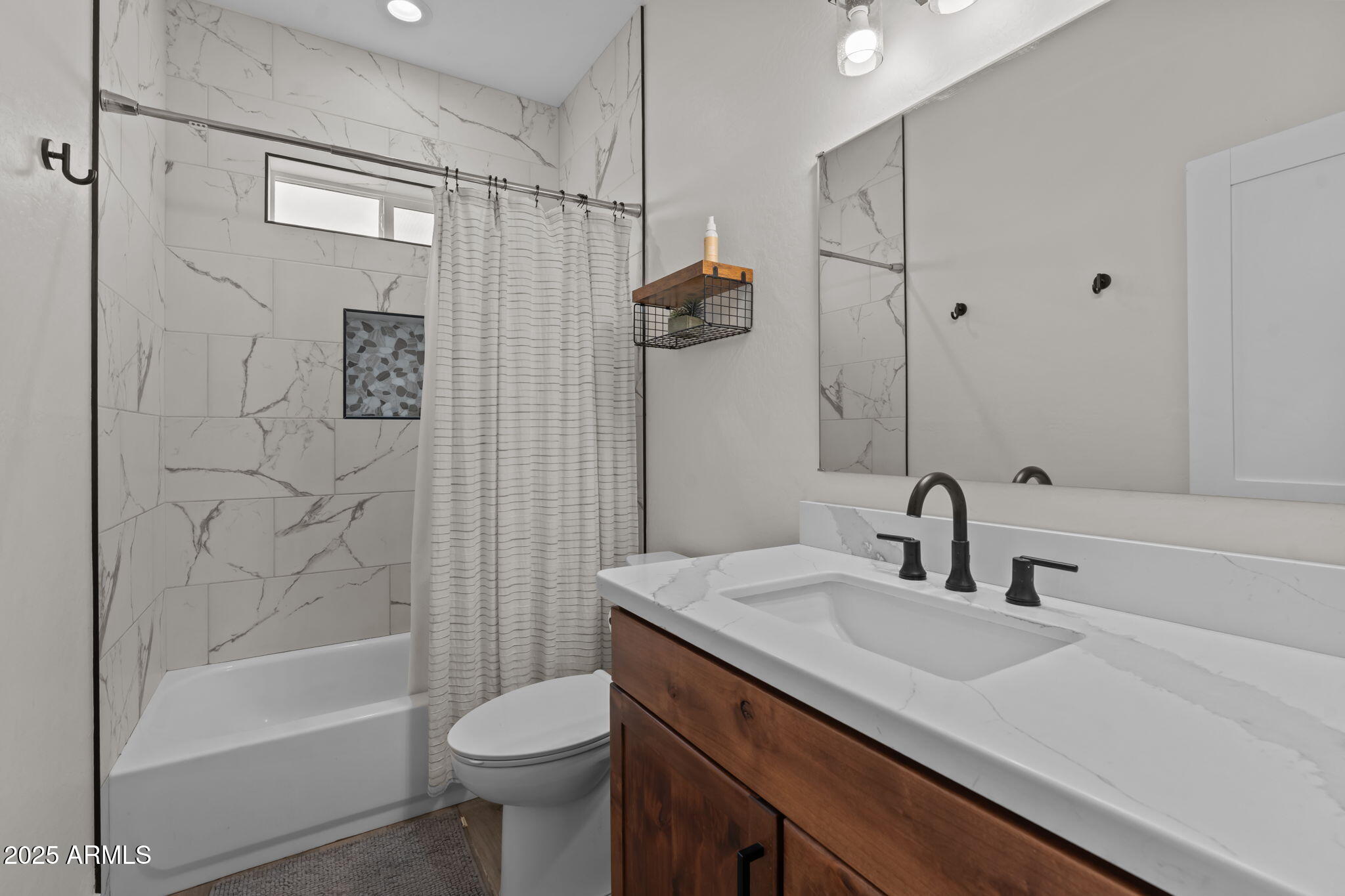 46130 West Trotter Road Wickenburg, AZ 85390 - Photo 30 of 55 a bathroom with a sink toilet and shower