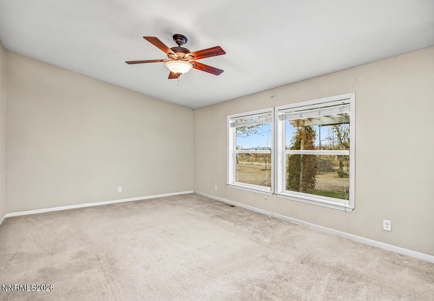 4141 Schindler Road Fallon, NV 89406 - Photo 11 of 25 a view of an empty room with a window