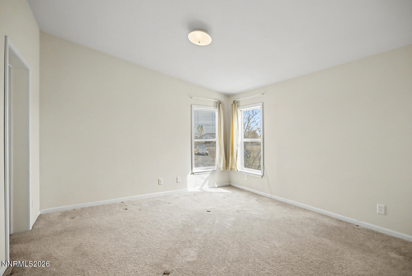 4141 Schindler Road Fallon, NV 89406 - Photo 16 of 25 a view of an empty room with a window