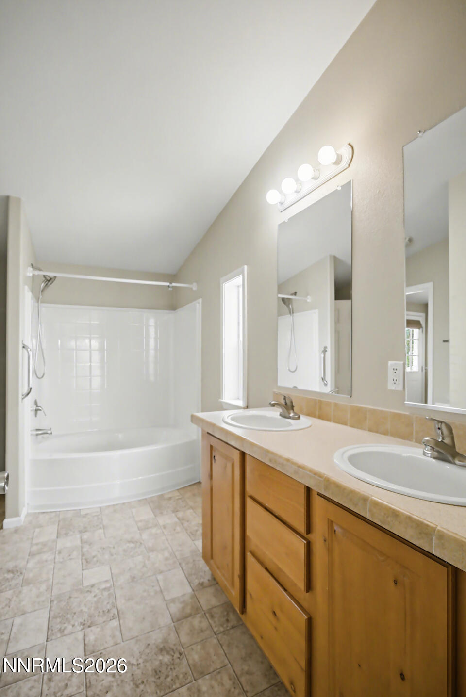 4141 Schindler Road Fallon, NV 89406 - Photo 17 of 25 a bathroom with a tub sink and mirror