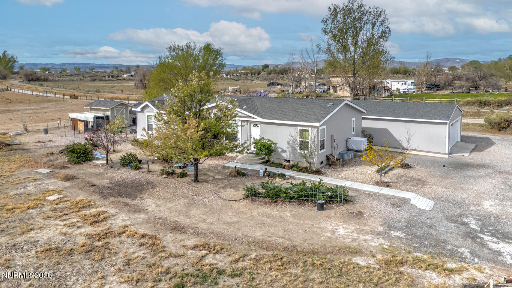 4141 Schindler Road Fallon, NV 89406 - Photo 2 of 25 a view of a house with a yard and sitting area