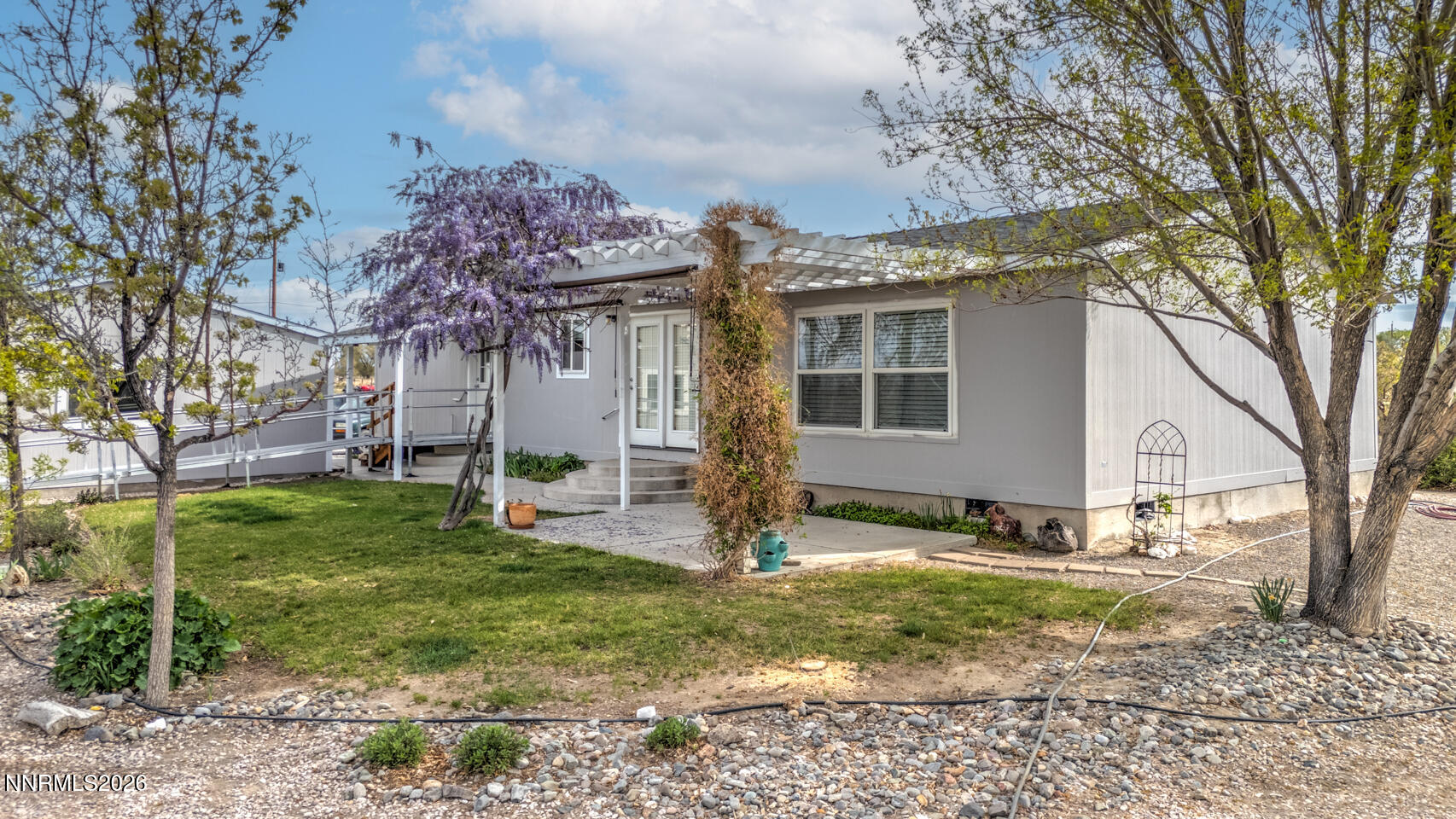 4141 Schindler Road Fallon, NV 89406 - Photo 23 of 25 a view of a house with a yard