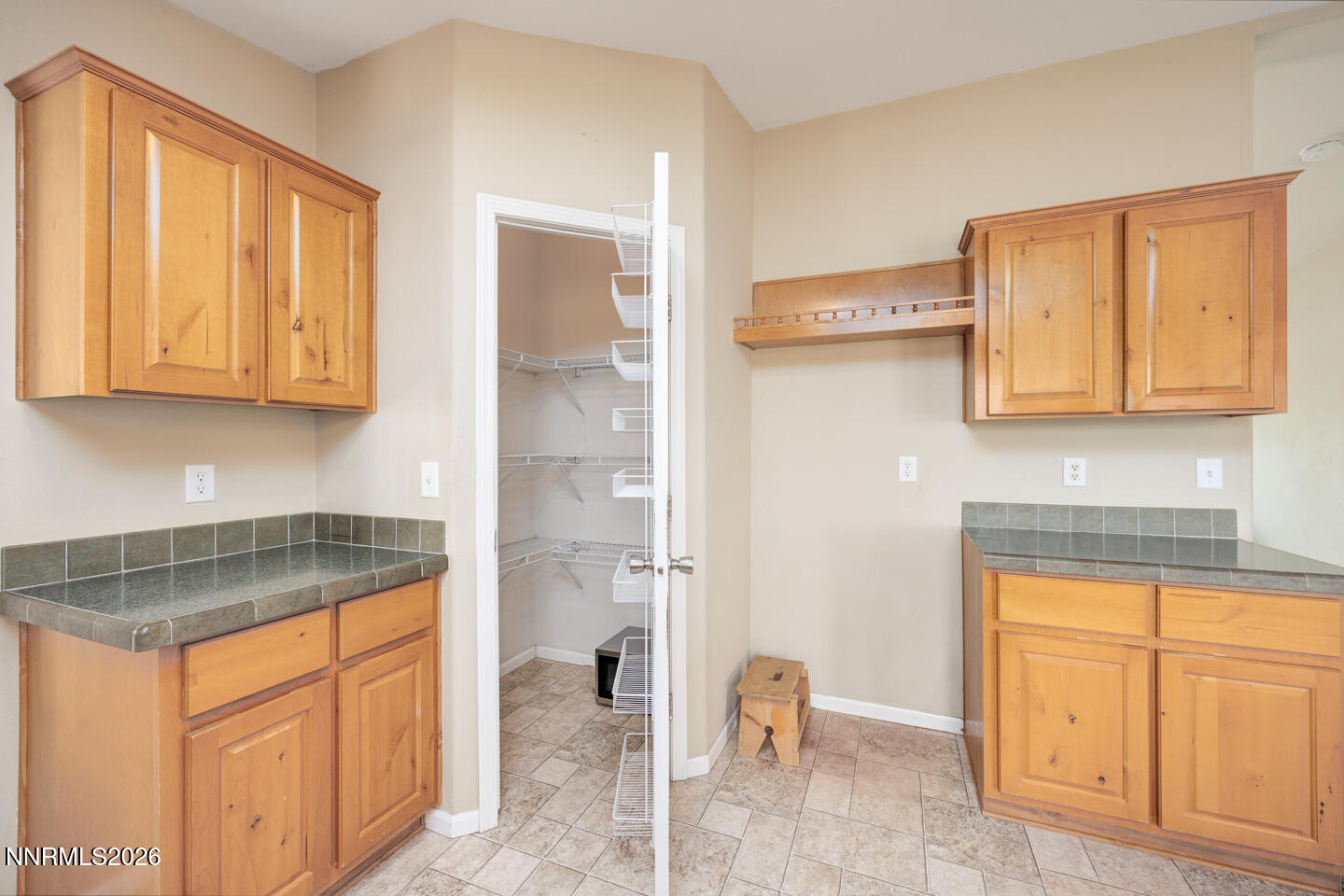 4141 Schindler Road Fallon, NV 89406 - Photo 8 of 25 a kitchen with stainless steel appliances granite countertop a sink and cabinets
