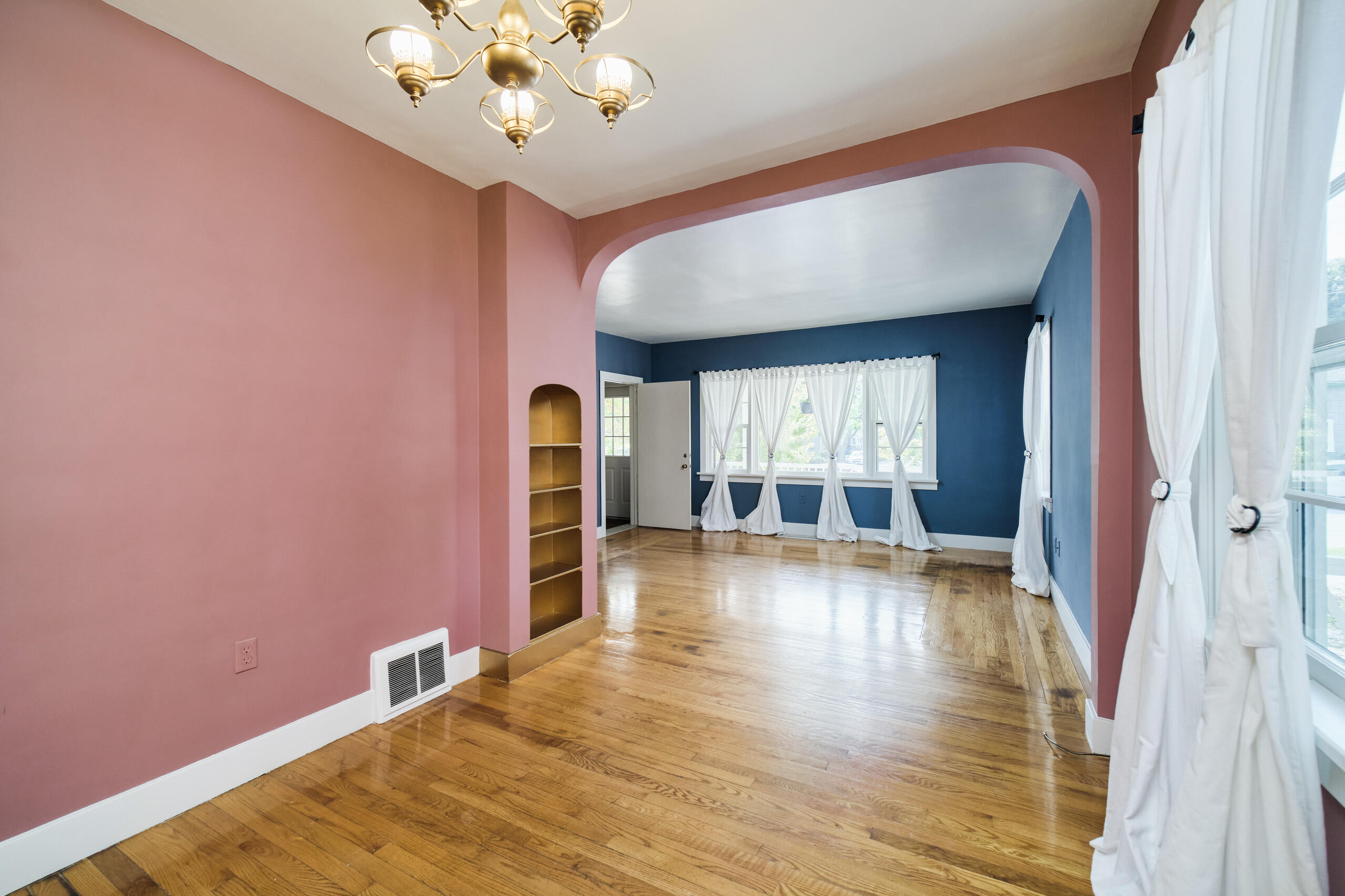 244 5th Street Manistee, MI 49660 - Photo 7 of 45 Hardwood floors continue into living rm