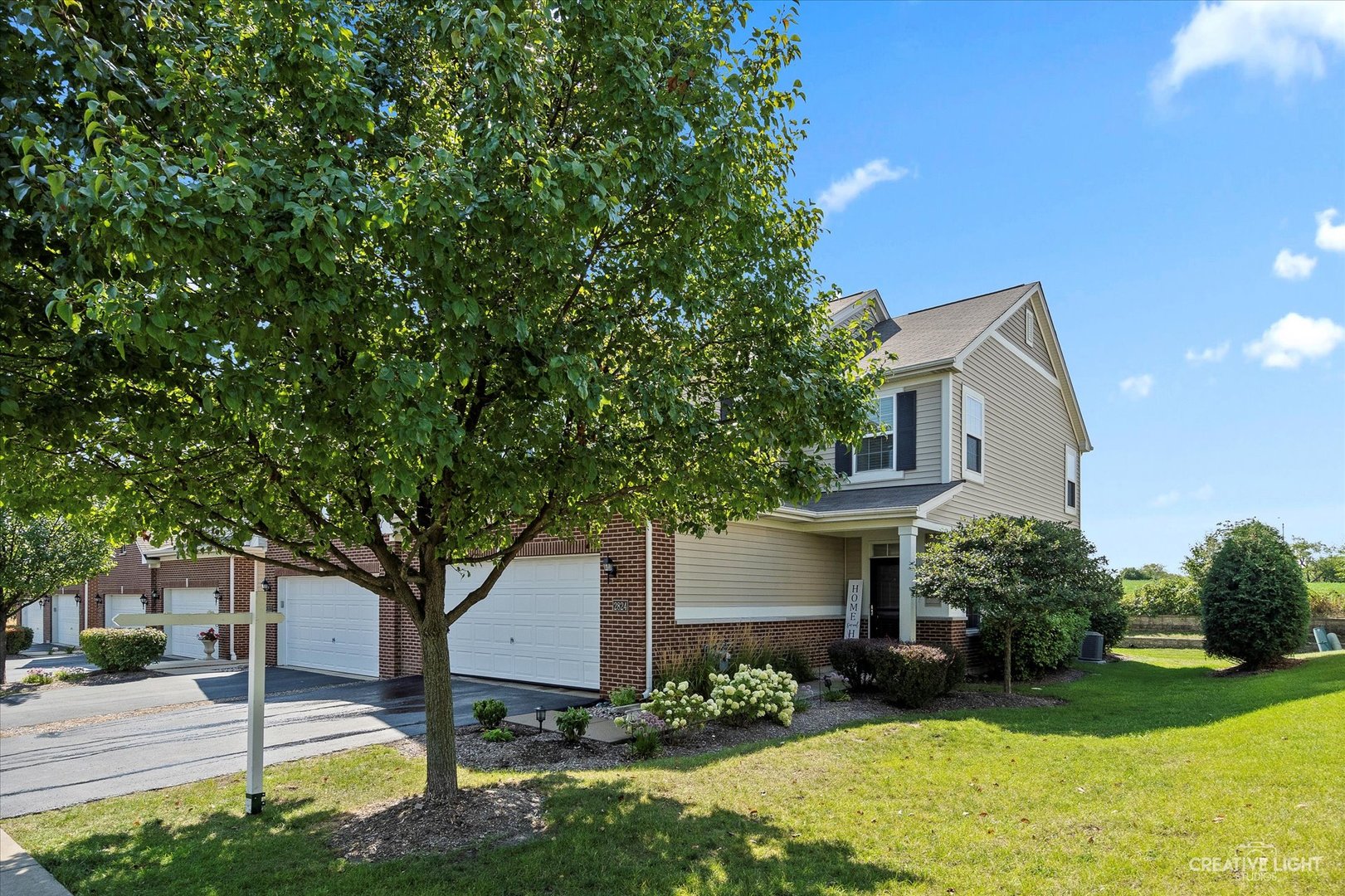 2824 Church Road Aurora, IL 60502 - Photo 2 of 20 a front view of a house with garden