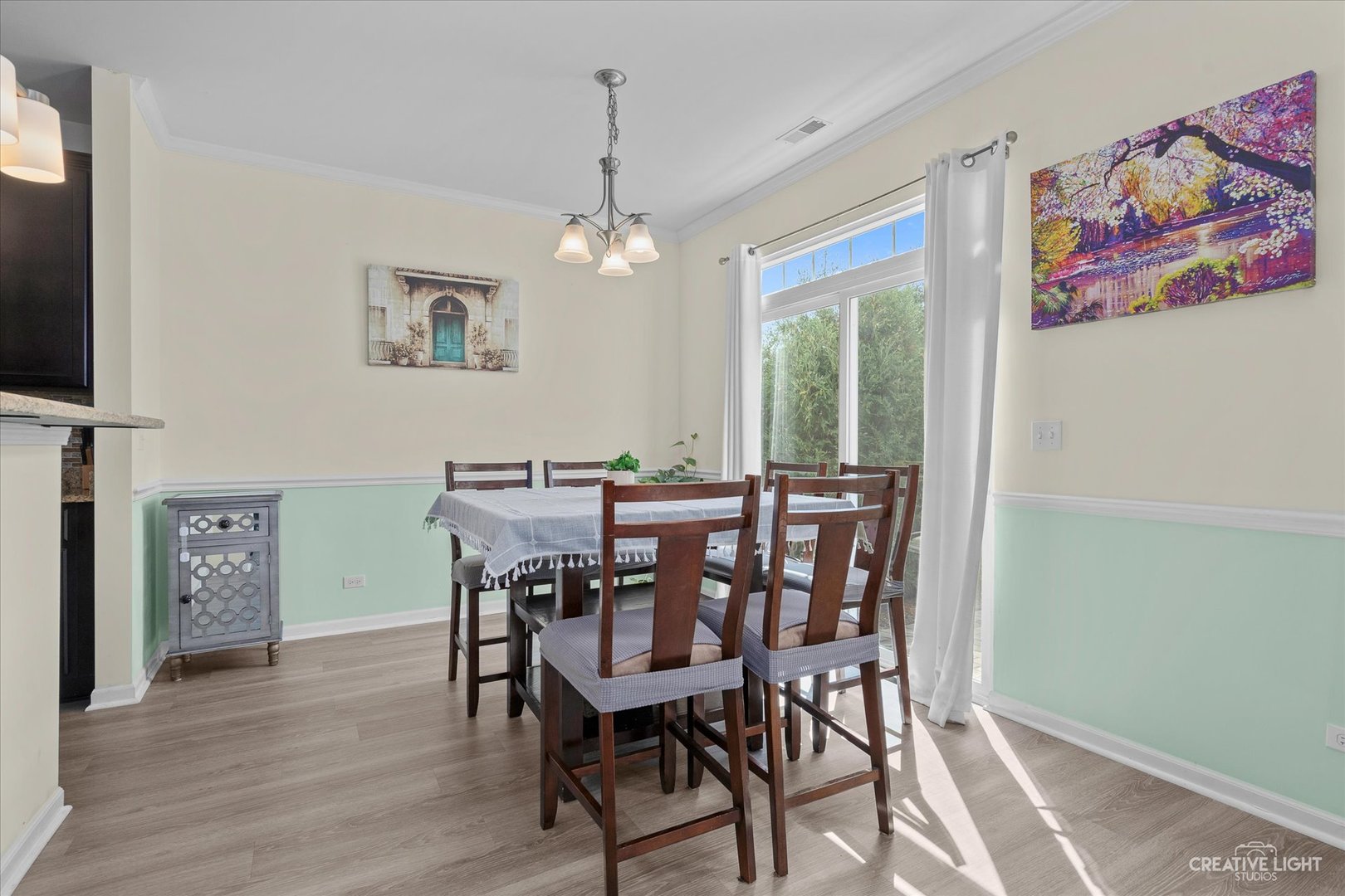 2824 Church Road Aurora, IL 60502 - Photo 6 of 20 a view of a dining room with furniture window and wooden floor