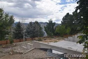 a view of a yard with an outdoor space