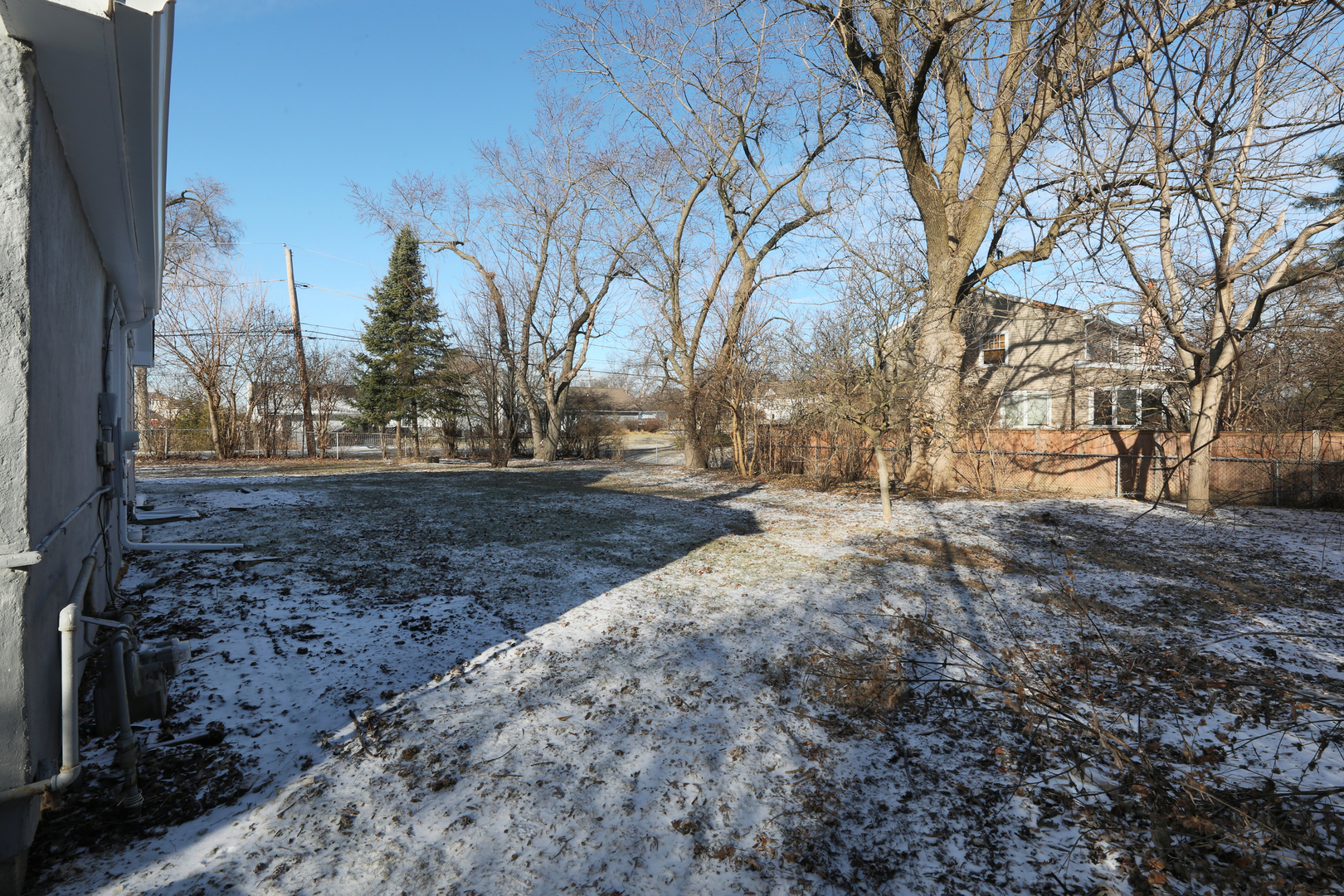 2015 Greenview Road Northbrook, IL 60062 - Photo 2 of 17 a view of yard covered with snow in outdoor