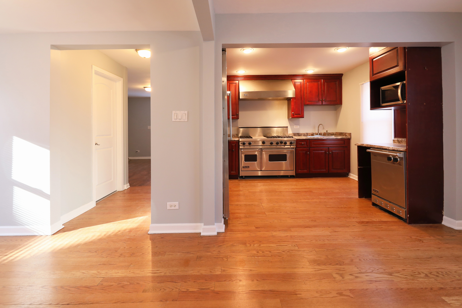 2015 Greenview Road Northbrook, IL 60062 - Photo 5 of 17 a kitchen with stainless steel appliances granite countertop a refrigerator and a stove top oven