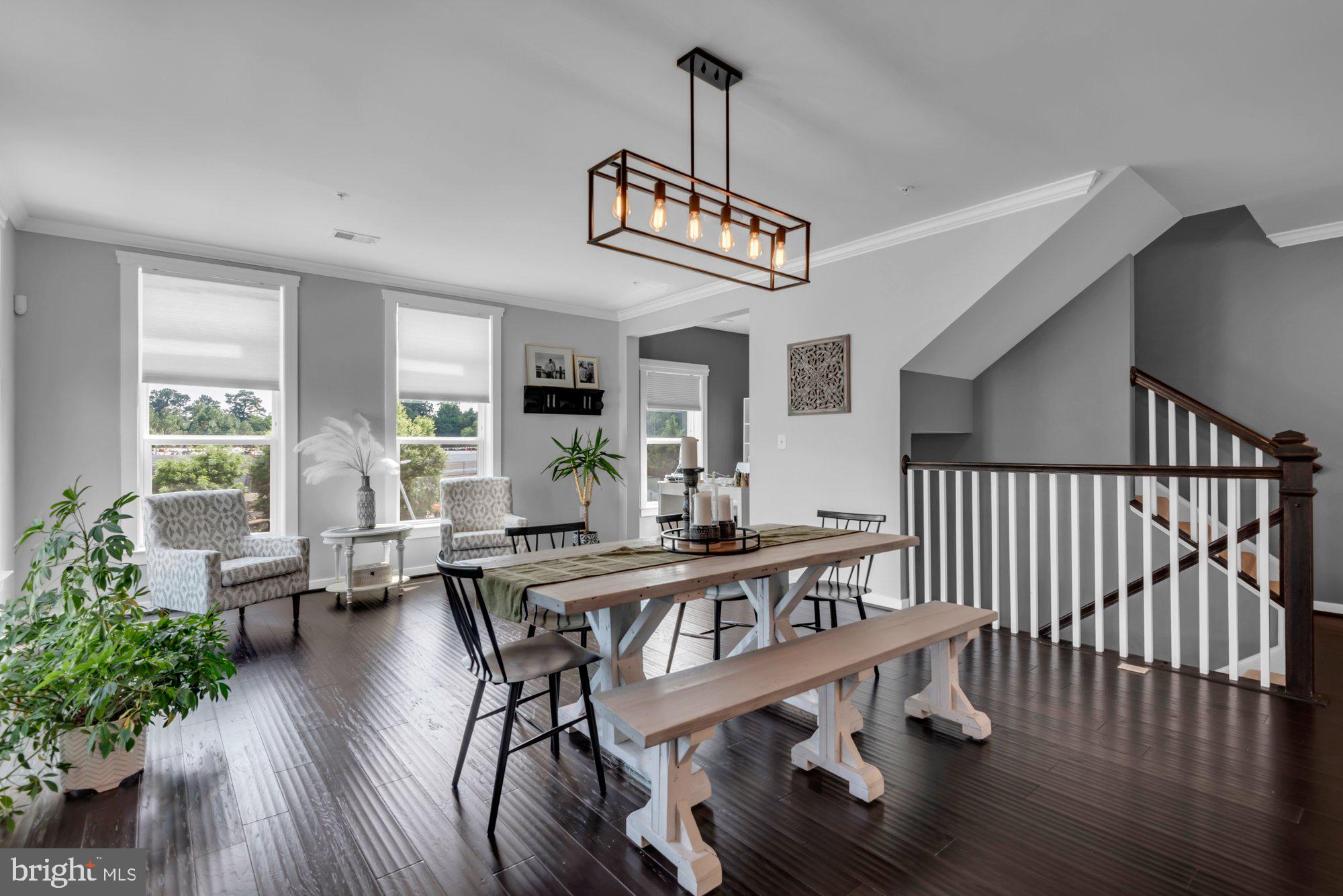 547 Leftwich Lane, Unit 88 Annapolis, MD 21401 - Photo 16 of 50 Light-Filled Dining Area with Artisan Chandelier