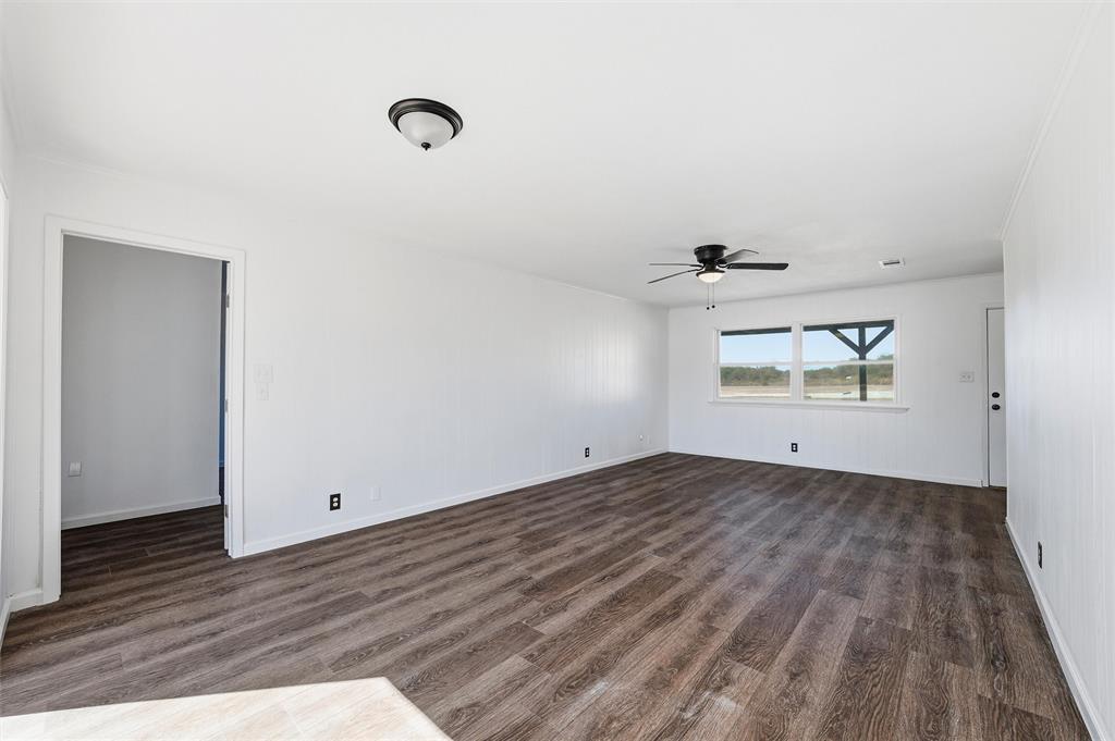 100 West Dilworth Road Italy, TX 76651 - Photo 5 of 38 wooden floor in an empty room