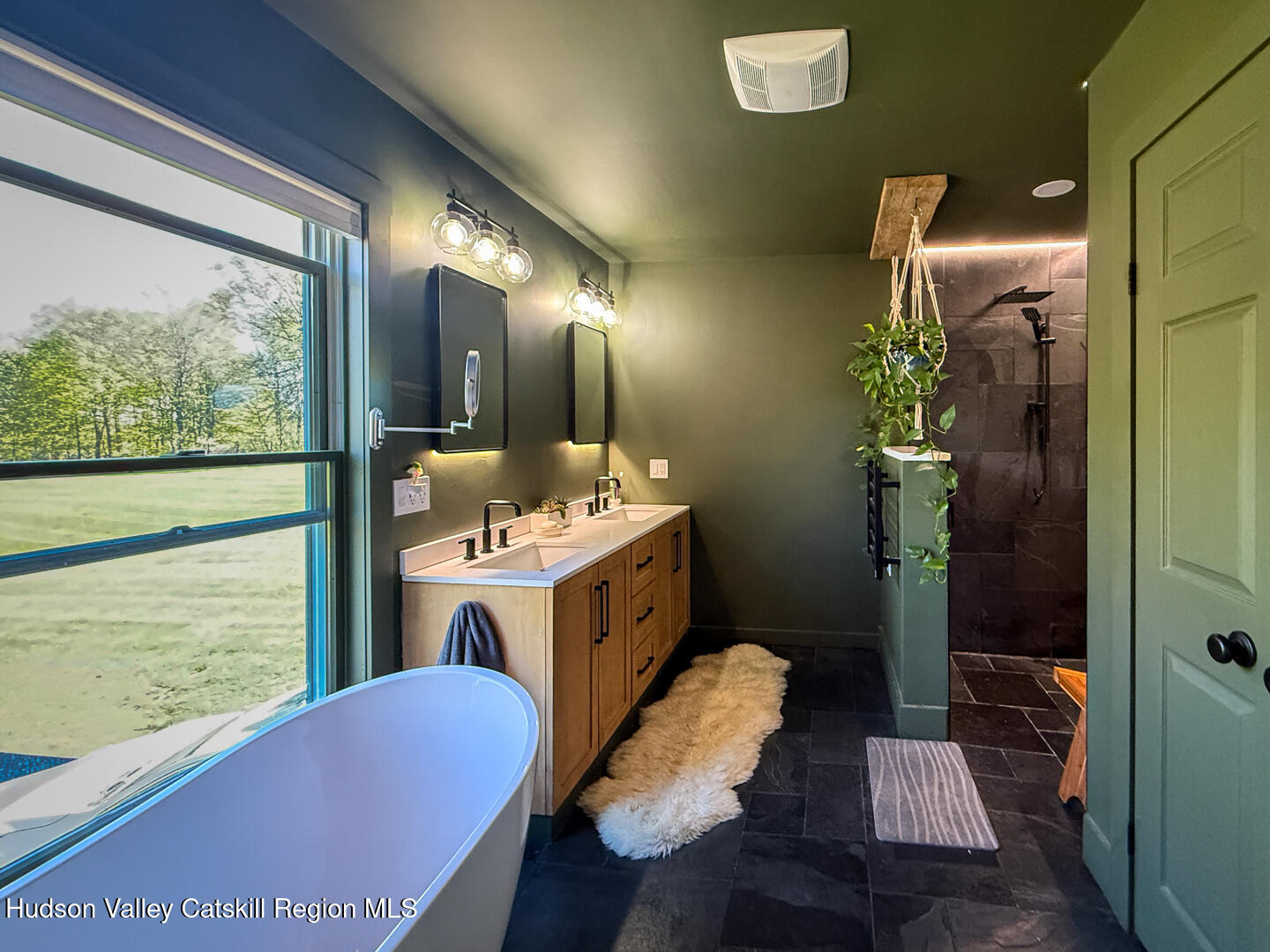 787 Co Rte 6 Germantown, NY 12526 - Photo 15 of 35 a spacious bathroom with a granite countertop sink and a mirror