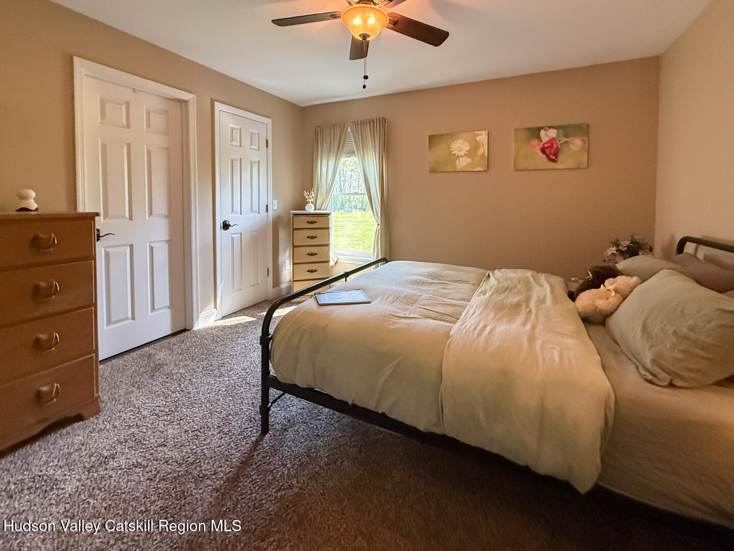 787 Co Rte 6 Germantown, NY 12526 - Photo 19 of 35 a bedroom with a bed and a chandelier