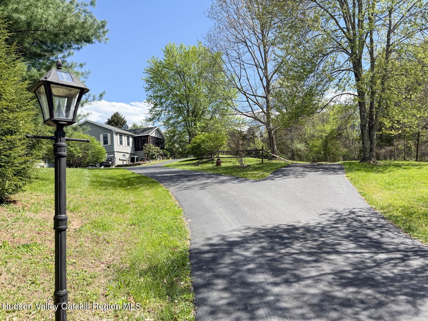 787 Co Rte 6 Germantown, NY 12526 - Photo 31 of 35 a front view of a house with a yard and trees