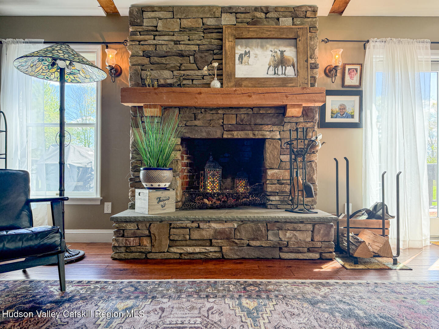 787 Co Rte 6 Germantown, NY 12526 - Photo 4 of 35 a living room with furniture and a fireplace