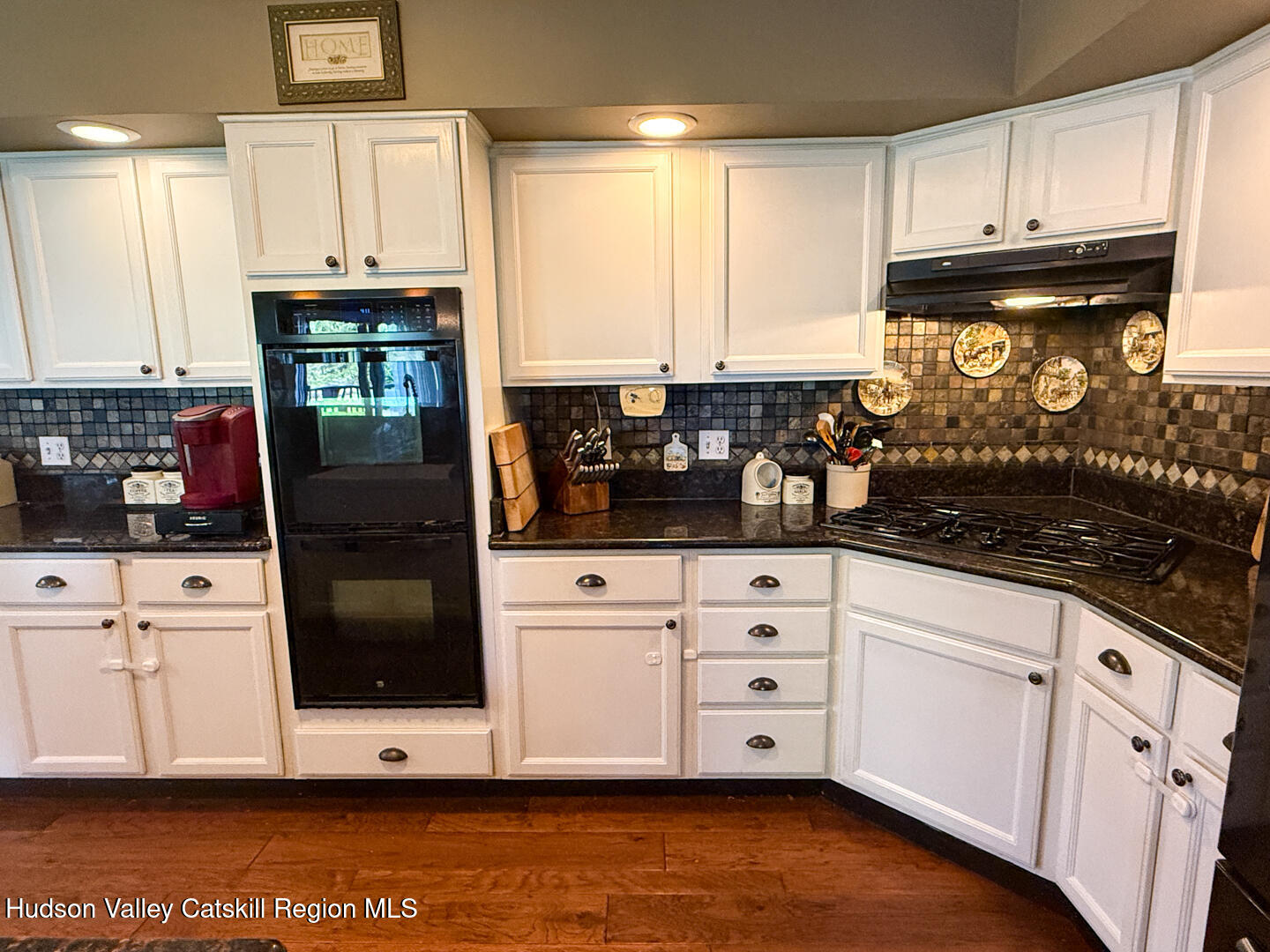 787 Co Rte 6 Germantown, NY 12526 - Photo 7 of 35 a kitchen with stainless steel appliances granite countertop a stove a white cabinet and a granite counter top