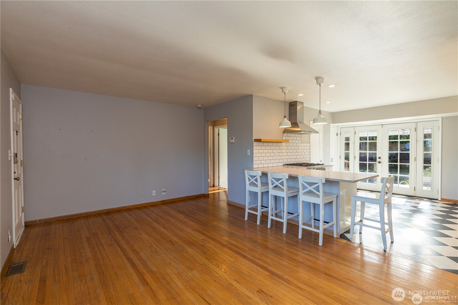 8601 36th Avenue Southwest Seattle, WA 98126 - Photo 6 of 28 a view of a dining room with furniture and wooden floor