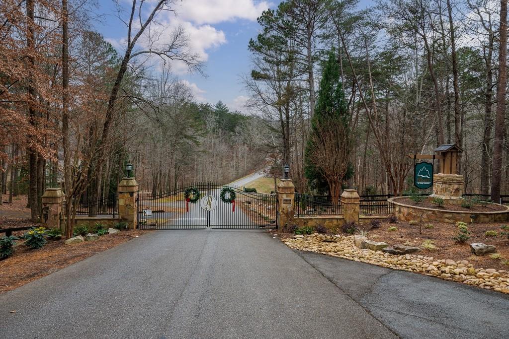 267 Sharp Mountain Parkway Jasper, GA 30143 - Photo 2 of 55 a view of a park with large trees