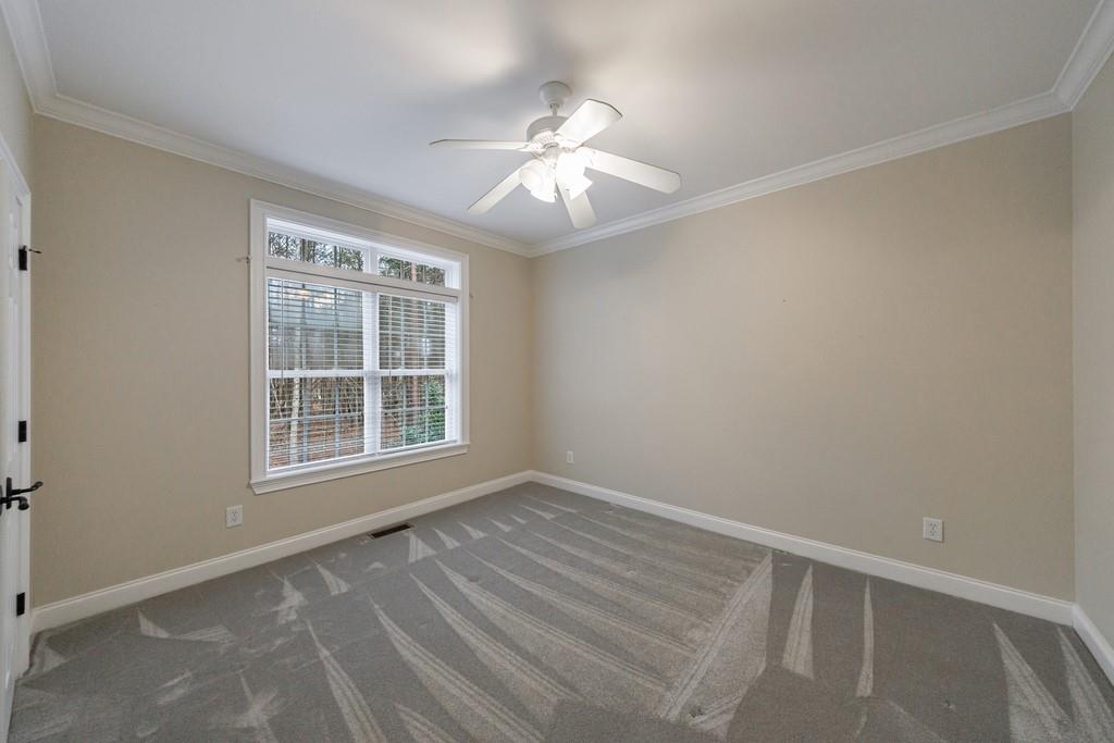 267 Sharp Mountain Parkway Jasper, GA 30143 - Photo 26 of 55 a view of an empty room with wooden floor and a window