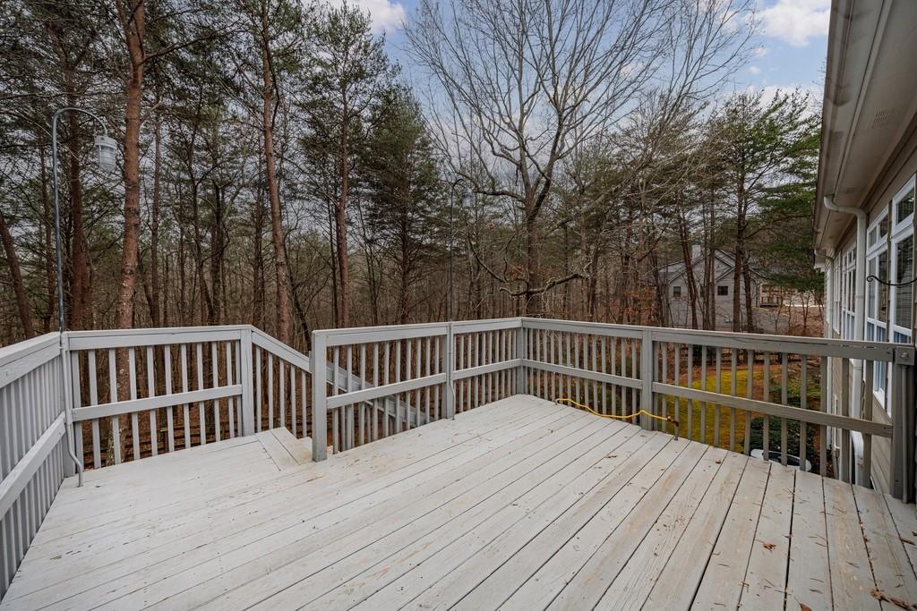 267 Sharp Mountain Parkway Jasper, GA 30143 - Photo 32 of 55 a view of deck with wooden floor and fence