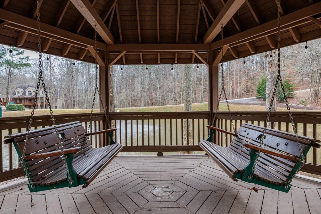 267 Sharp Mountain Parkway Jasper, GA 30143 - Photo 51 of 55 a view of a roof deck with wooden floor