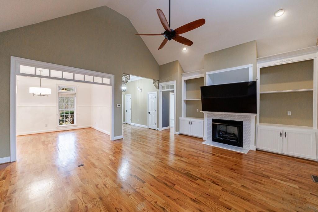 267 Sharp Mountain Parkway Jasper, GA 30143 - Photo 8 of 55 a view of a livingroom with an empty space and a fireplace