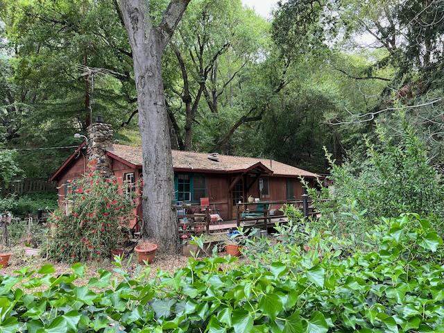 1011 Metcalf Road San Jose, CA 95138 - Photo 13 of 28 a view of a table and chairs under an umbrella