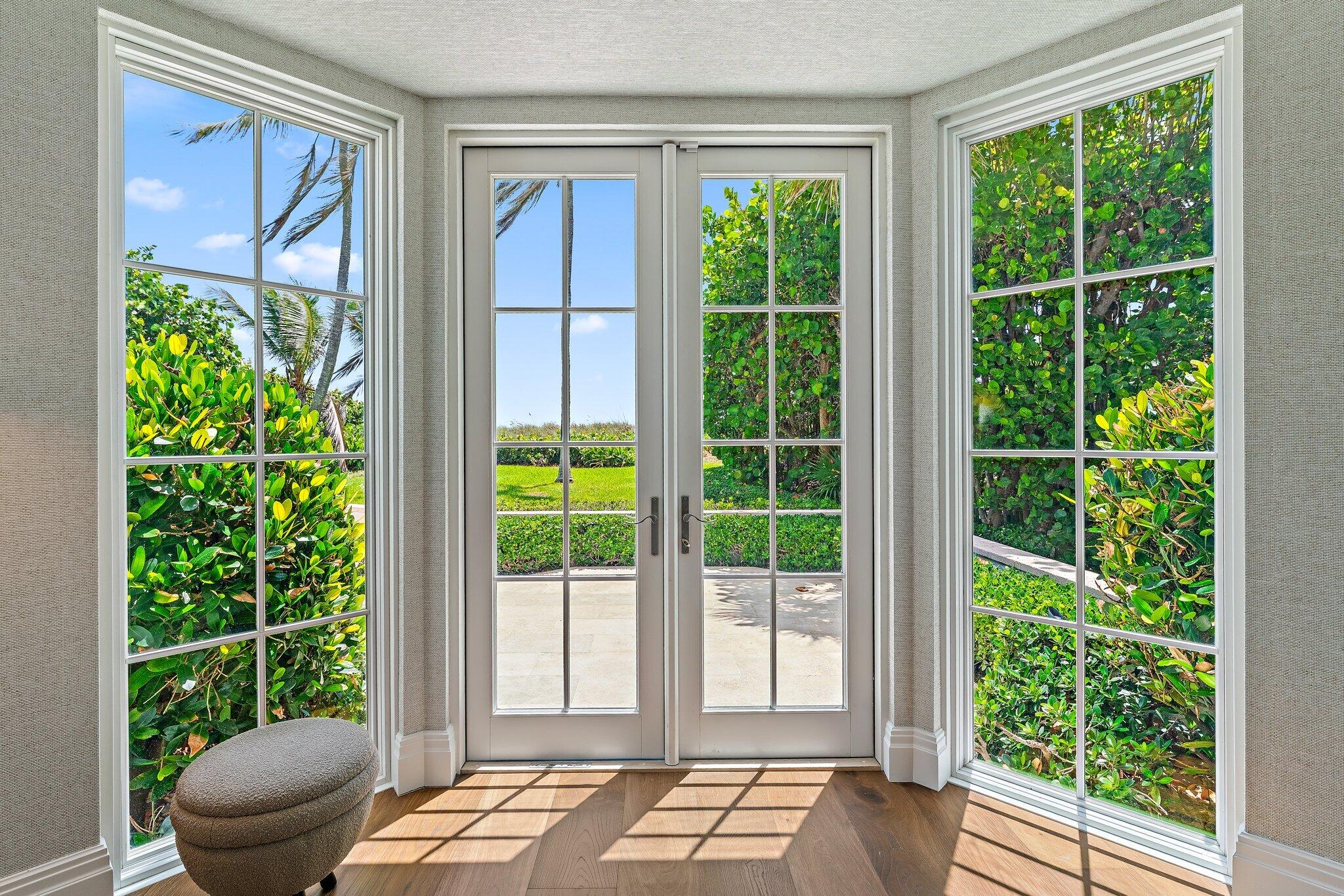43 North Beach Road Hobe Sound, FL 33455 - Photo 63 of 73 Primary Bedroom Door to Rear Patio