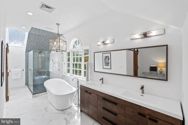 a bed room with a bed and a stove