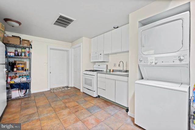 a view of a pathway both side of yard