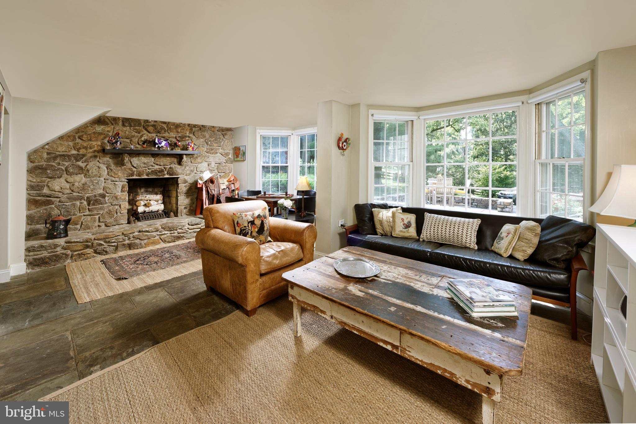 22780 Foxcroft Road Middleburg, VA 20117 - Photo 16 of 41 Family Room has stone gas fireplace & space for TV