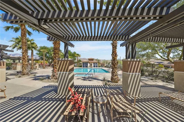 a view of balcony with wooden floor