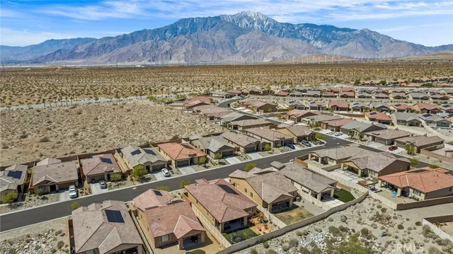 an aerial view of residential house and lake