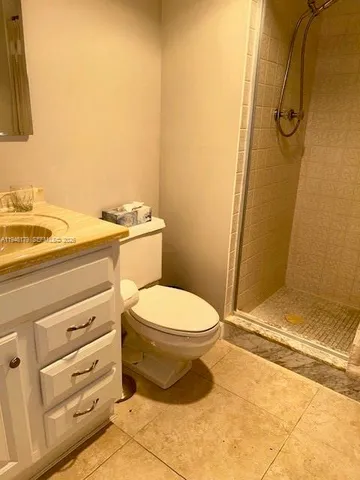a bathroom with a toilet and a sink