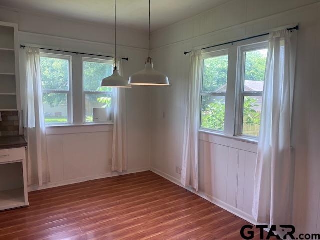 617 West Dobbs Street Tyler, TX 75701 - Photo 7 of 19 a view of empty room with wooden floor and fan